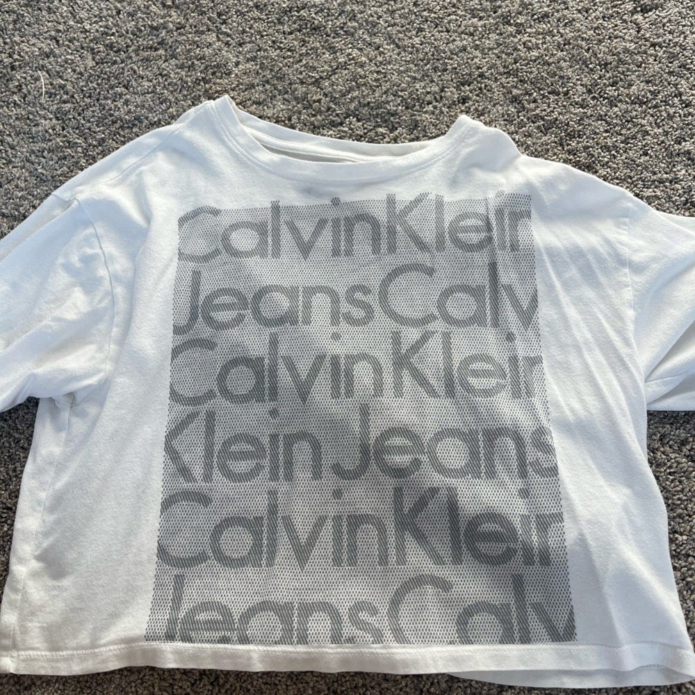 Woman loose T shirt. Print on the front and plane back